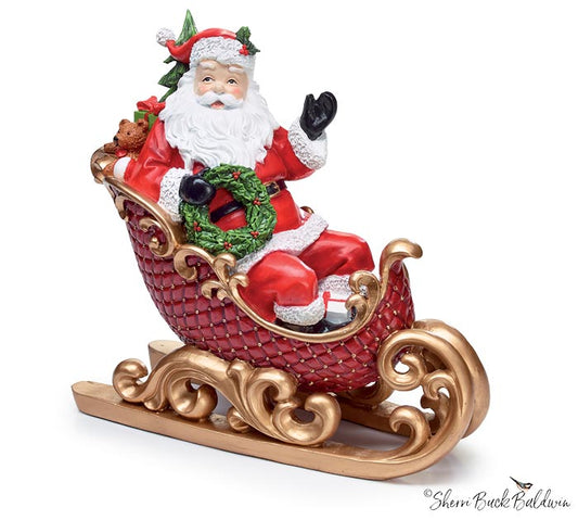 Santa In Sleigh Figurine